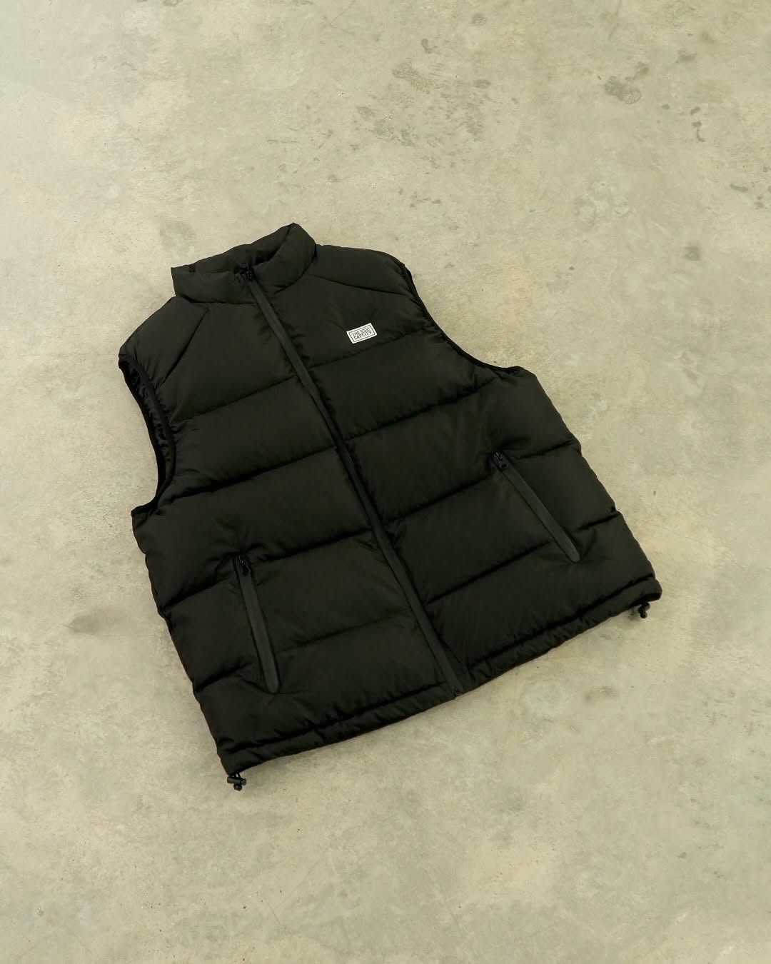 TCC 'WAVING FLAG' PUFFER VEST