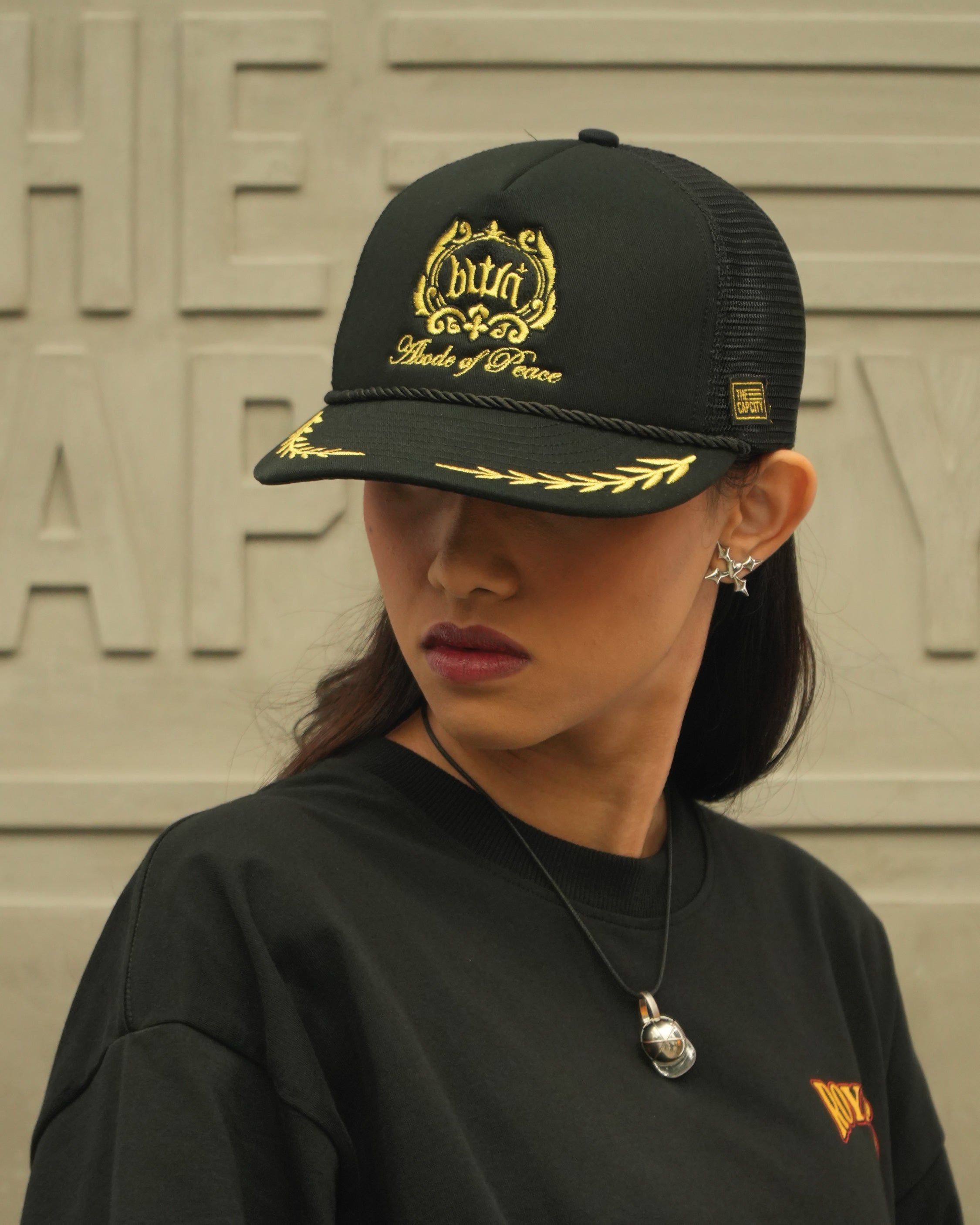 TCC ABODE OF PEACE 'BWN' PUFFY TRUCKER