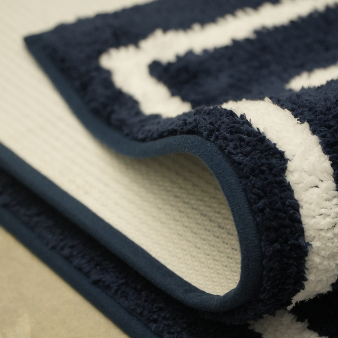TCC WAVING FLAG BATH MAT COLLECTION
