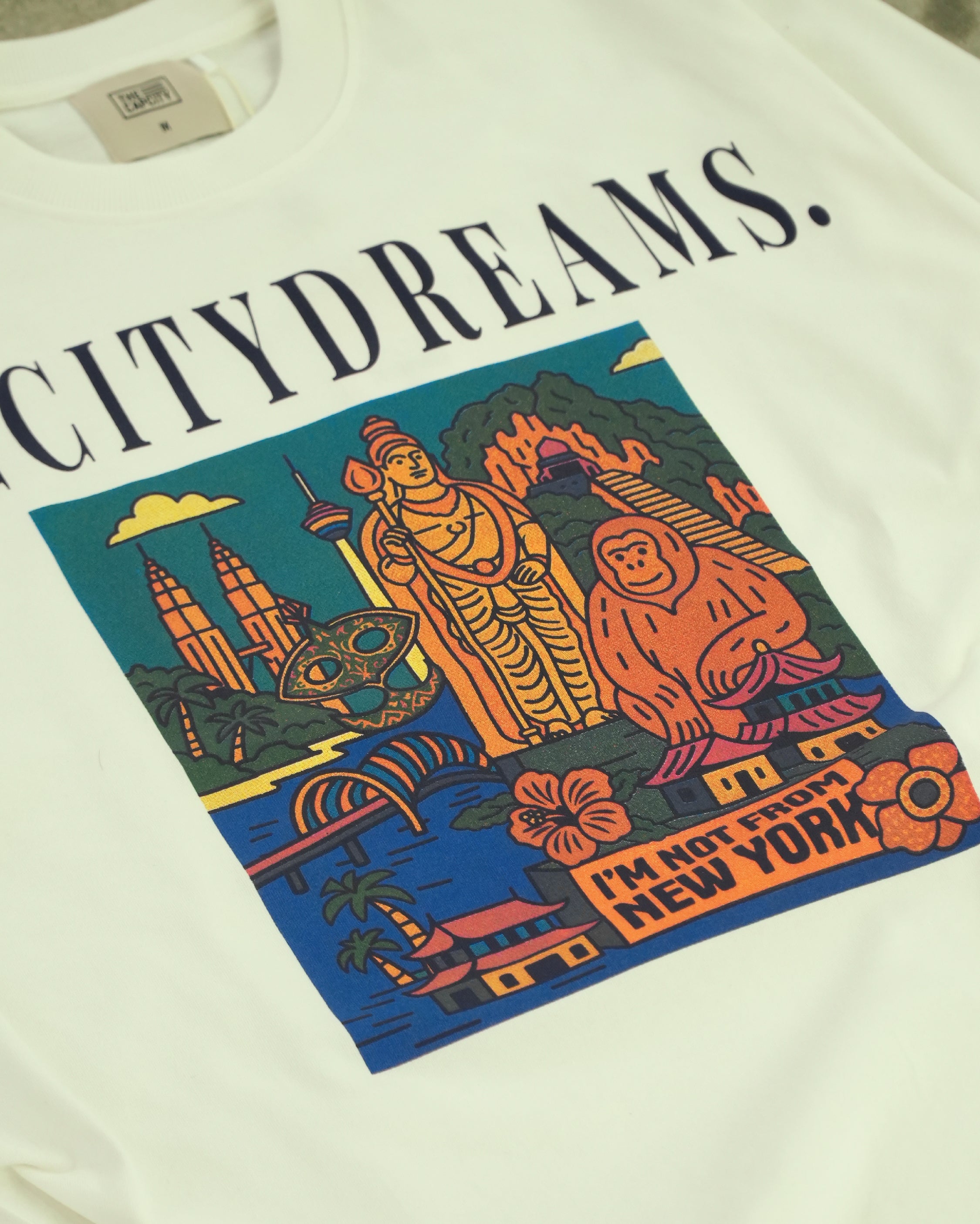 TCC BCD AROUND THE WORLD TEE