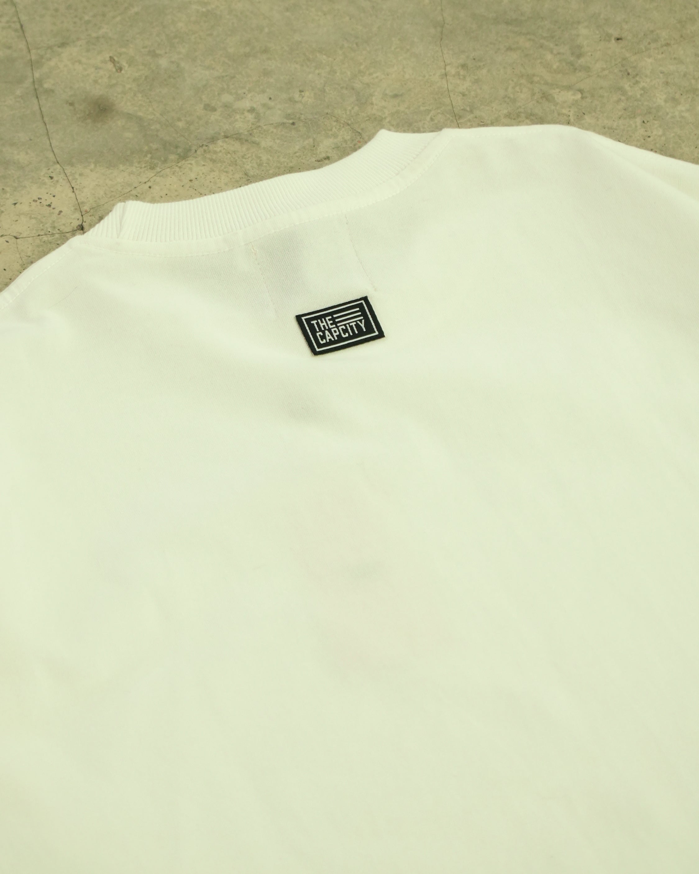 TCC BCD AROUND THE WORLD TEE