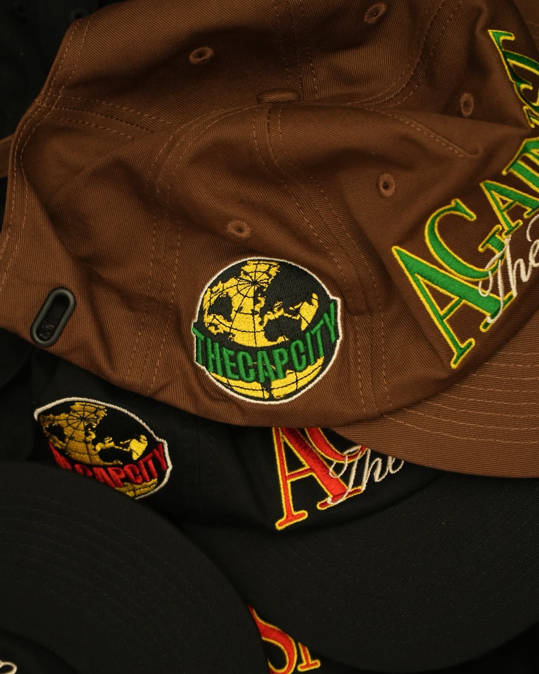TCC 'AGAINST THE WORLD' RELAXED-FIT CAP COLLECTION