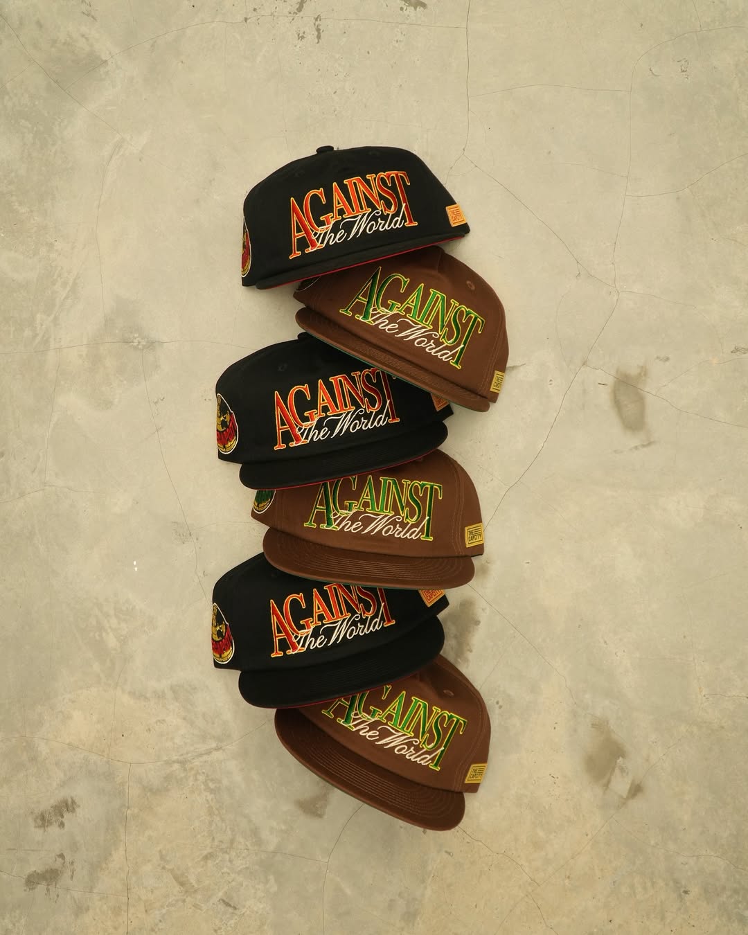 TCC 'AGAINST THE WORLD' RELAXED-FIT CAP COLLECTION