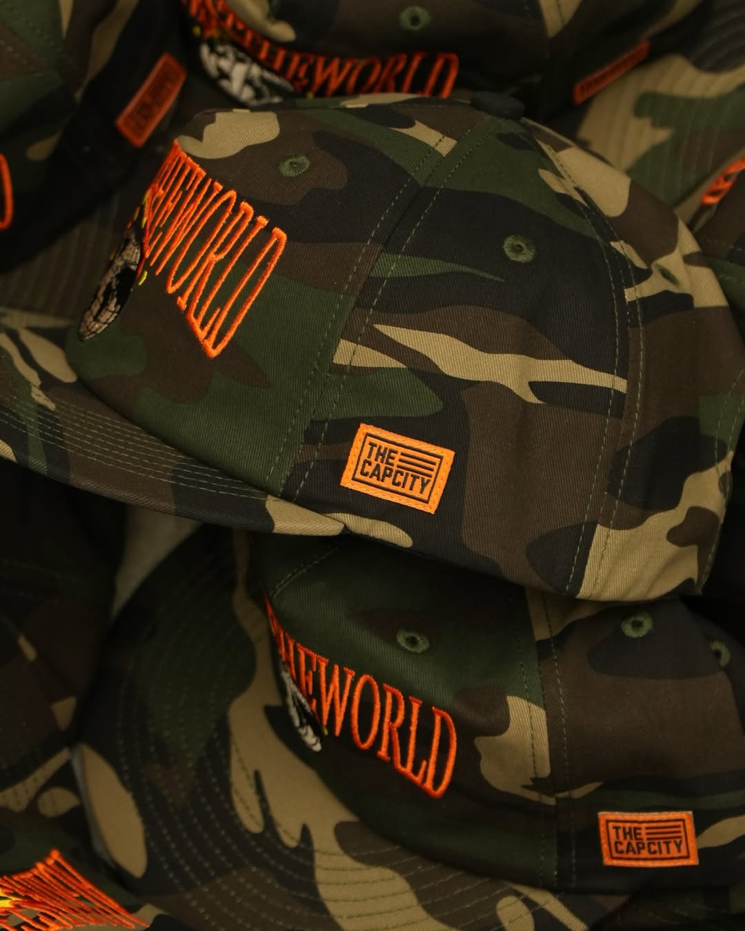 TCC 'AGAINST THE WORLD' RELAXED-FIT CAP COLLECTION