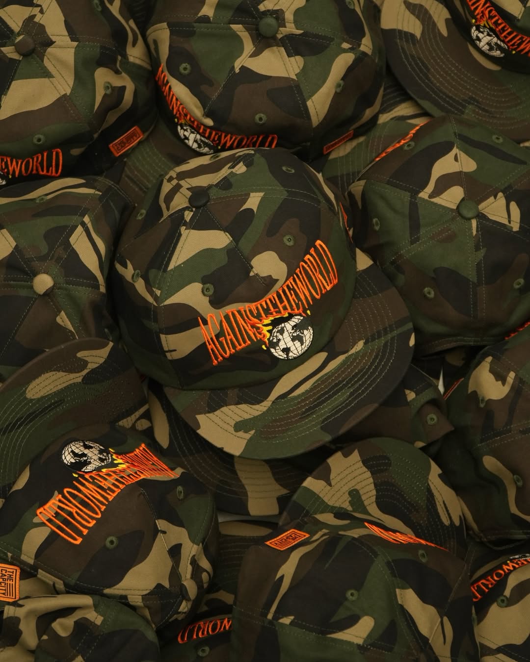 TCC 'AGAINST THE WORLD' RELAXED-FIT CAP COLLECTION