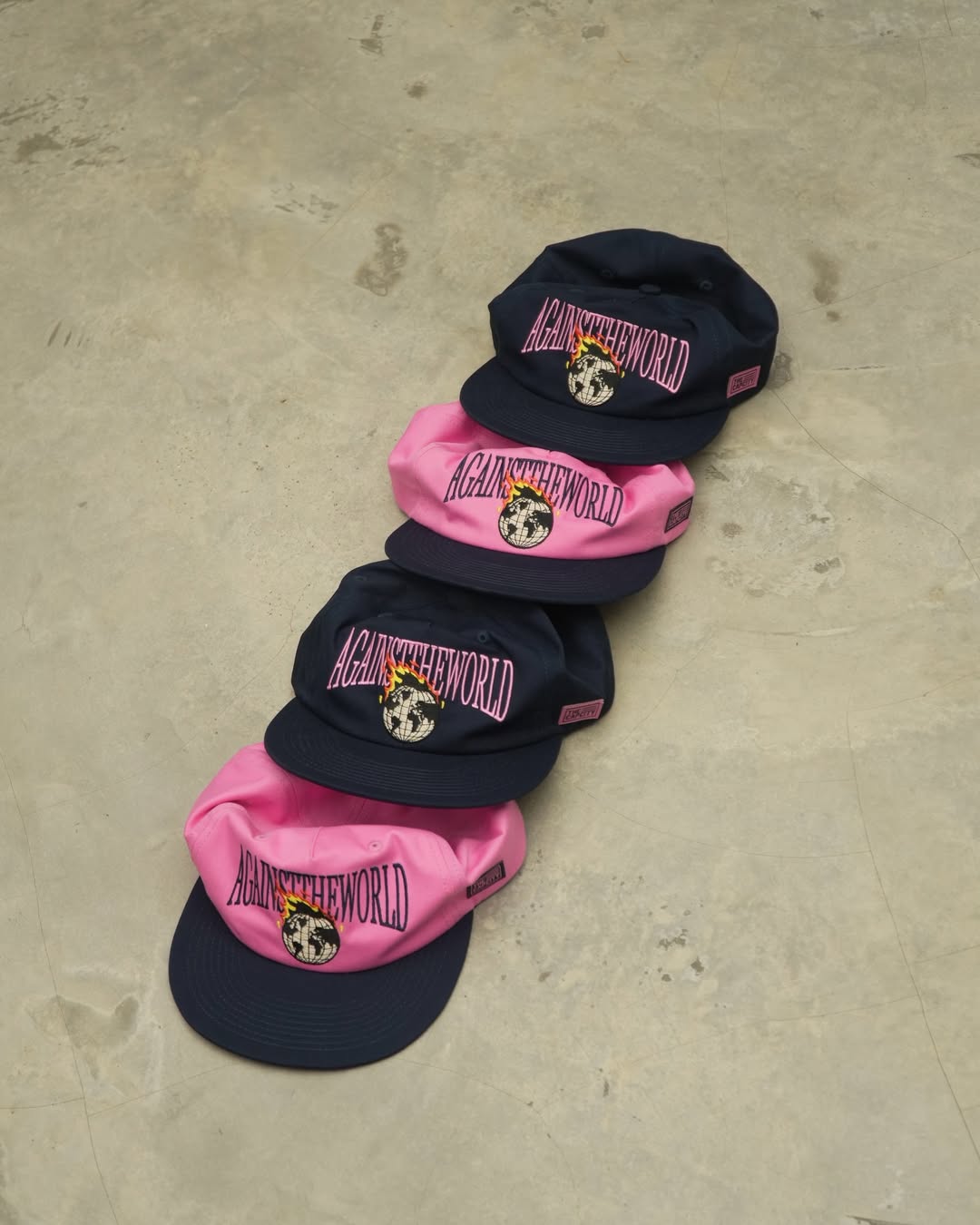 TCC 'AGAINST THE WORLD' RELAXED-FIT CAP COLLECTION