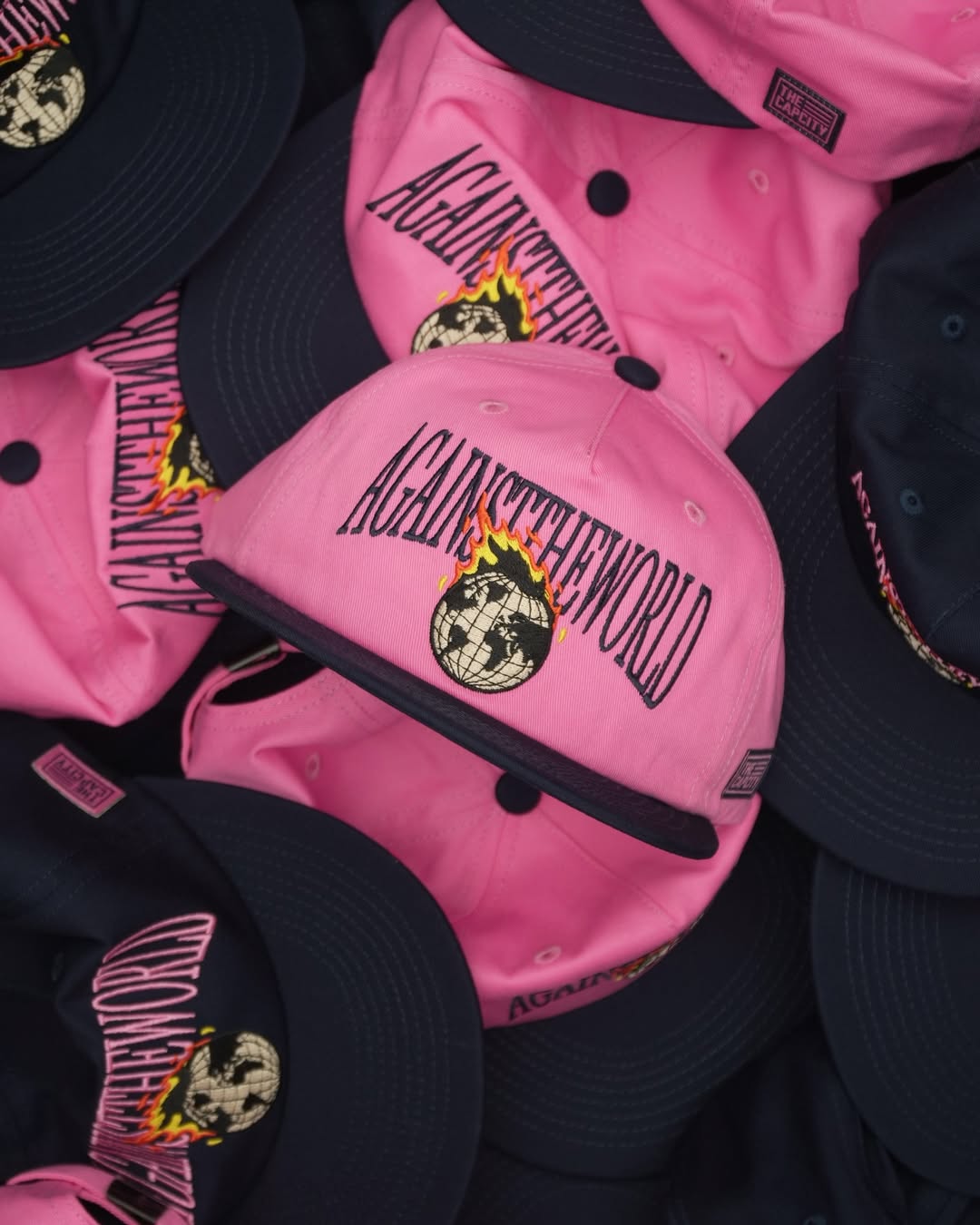 TCC 'AGAINST THE WORLD' RELAXED-FIT CAP COLLECTION