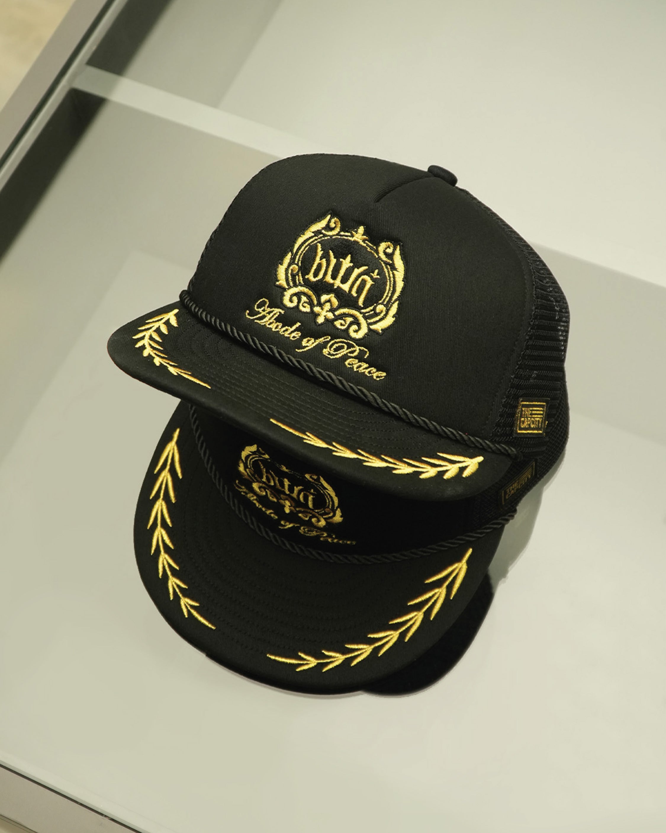 TCC ABODE OF PEACE 'BWN' PUFFY TRUCKER COLLECTION